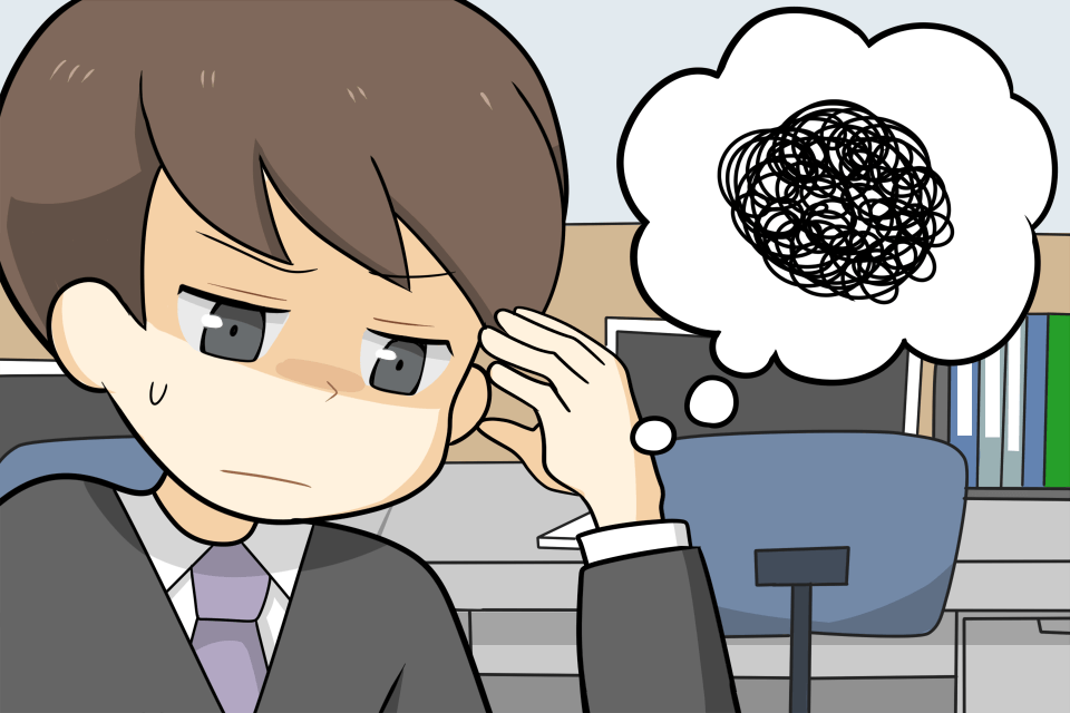 悩んでいる男性